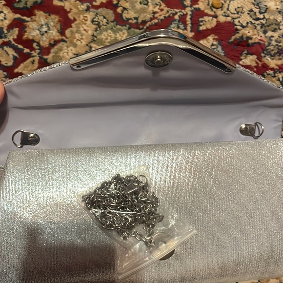 Silver clutch. Brand new. - Picture 2 of 3